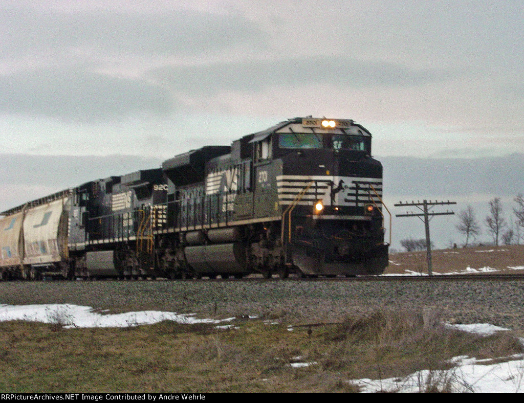 NS power swings around the curve at Church Road as it grinds up the hill with M340